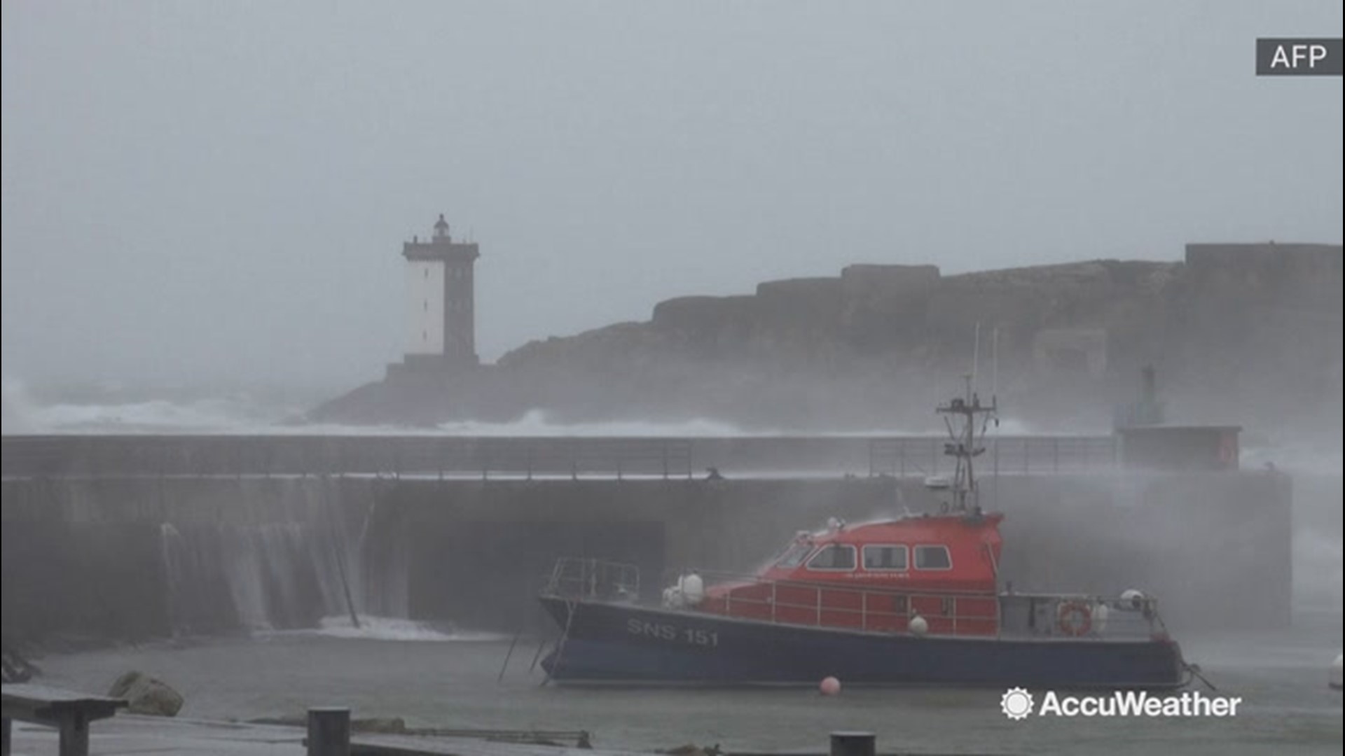 Strong winds churned up waves along the coast in Brittany, France, crashing into the western harbor on Jan. 14.