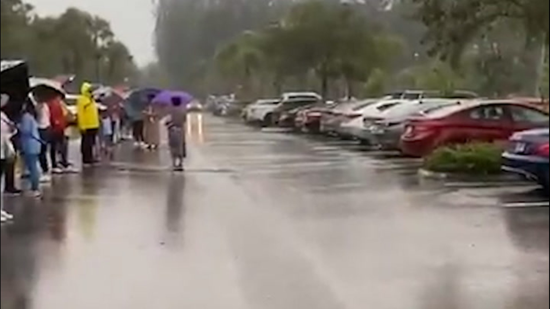 Early voting began in Delray Beach, Florida, on Monday, Oct. 19, drawing long lines of voters despite the pouring rain.
