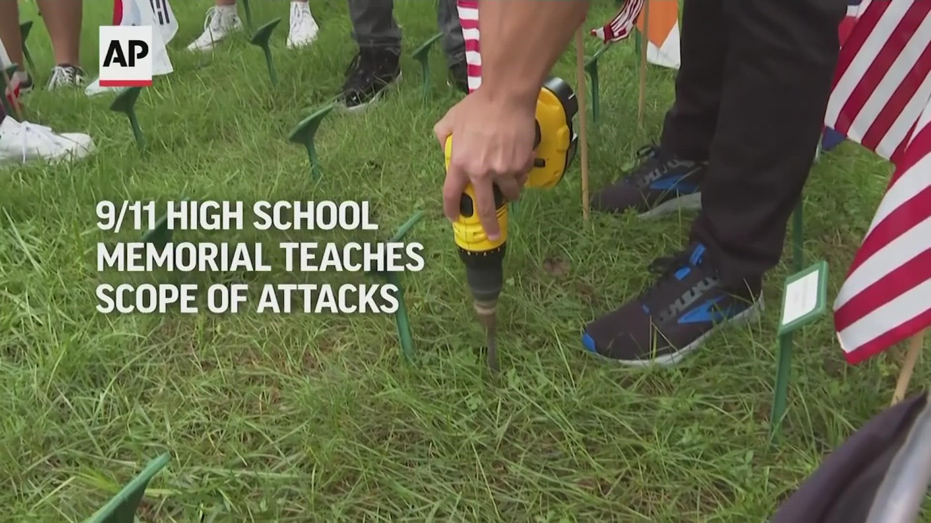 Each year students at a New Jersey high school install 2,977 flags on the front lawn, one for each person killed in the 9/11 terrorist attacks.