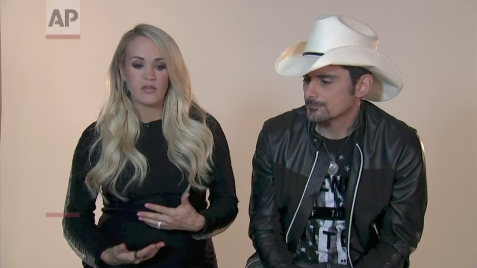Carrie Underwood and Brad Paisley are returning for their 11th time to host the CMA Awards, and Paisley said their job is to put viewers at ease and add some levity. (AP)