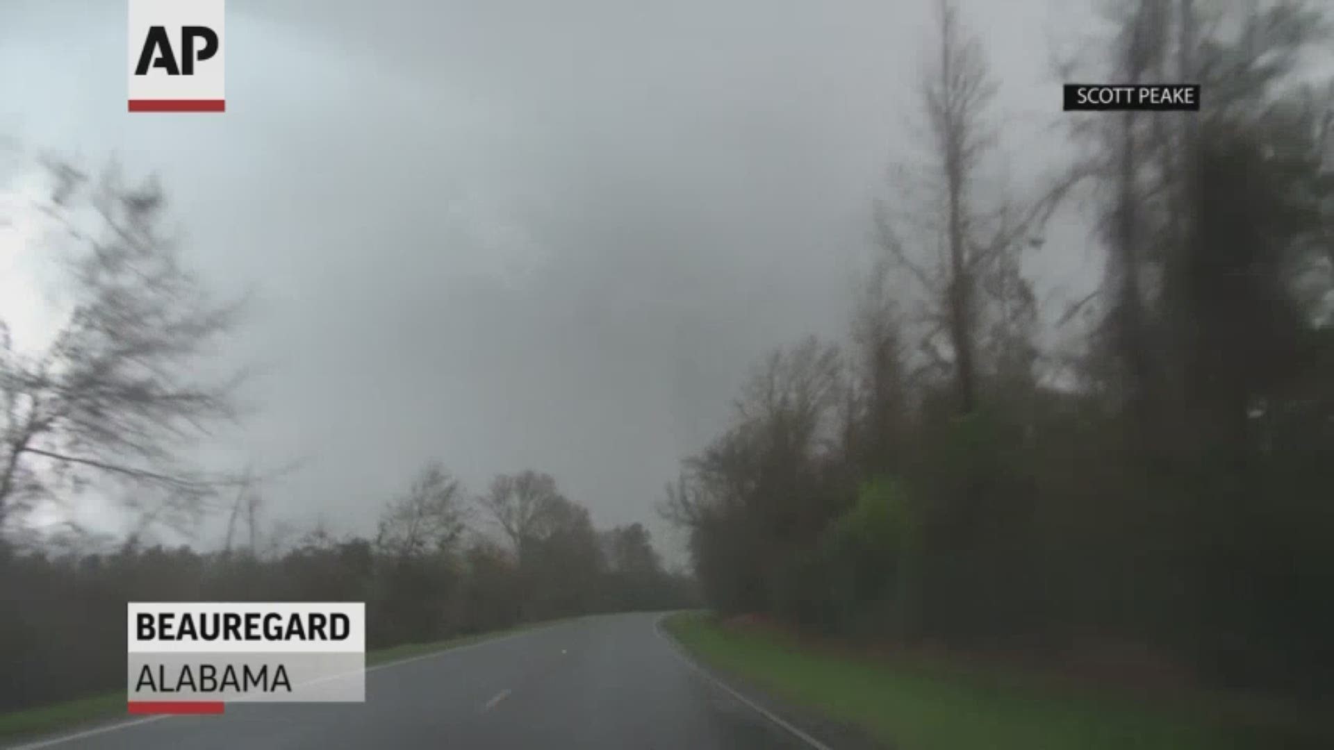 A video shot by storm chaser Scott Peake shows the moment the tornado hit the rural community of Beauregard in Alabama on Sunday, March 3.