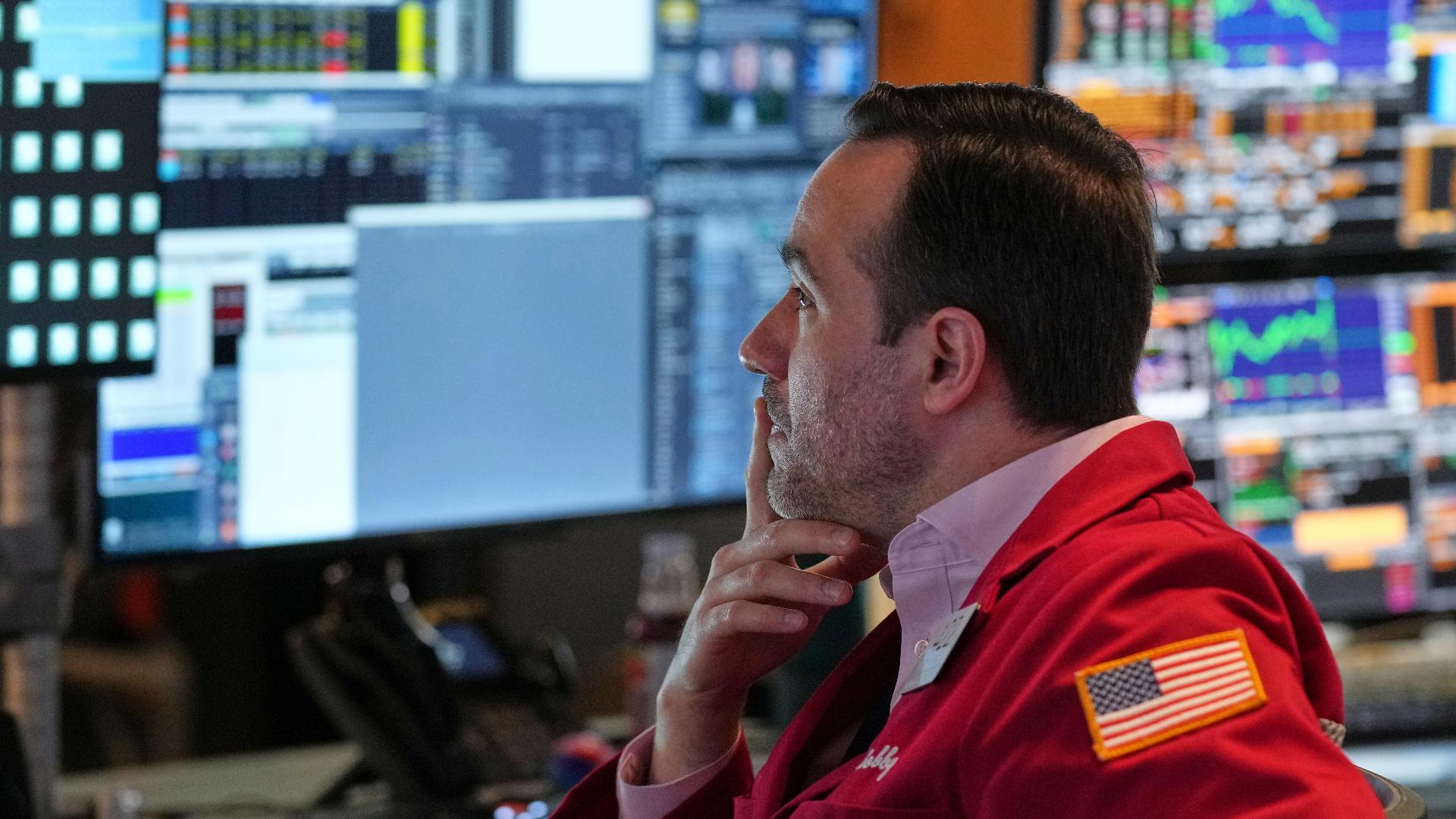 Stocks took another dive during trading to start the week, in part because of President Trump's repeated attacks on Federal Reserve Chair Jerome Powell.