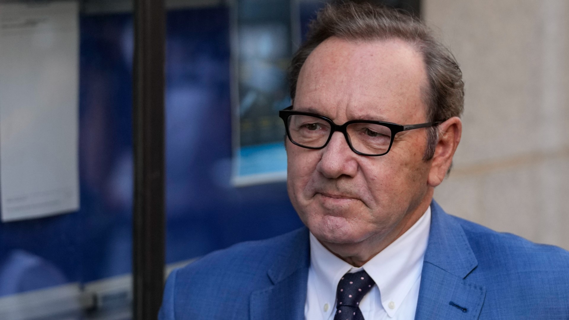 Kevin Spacey arrives at court for sex assault trial