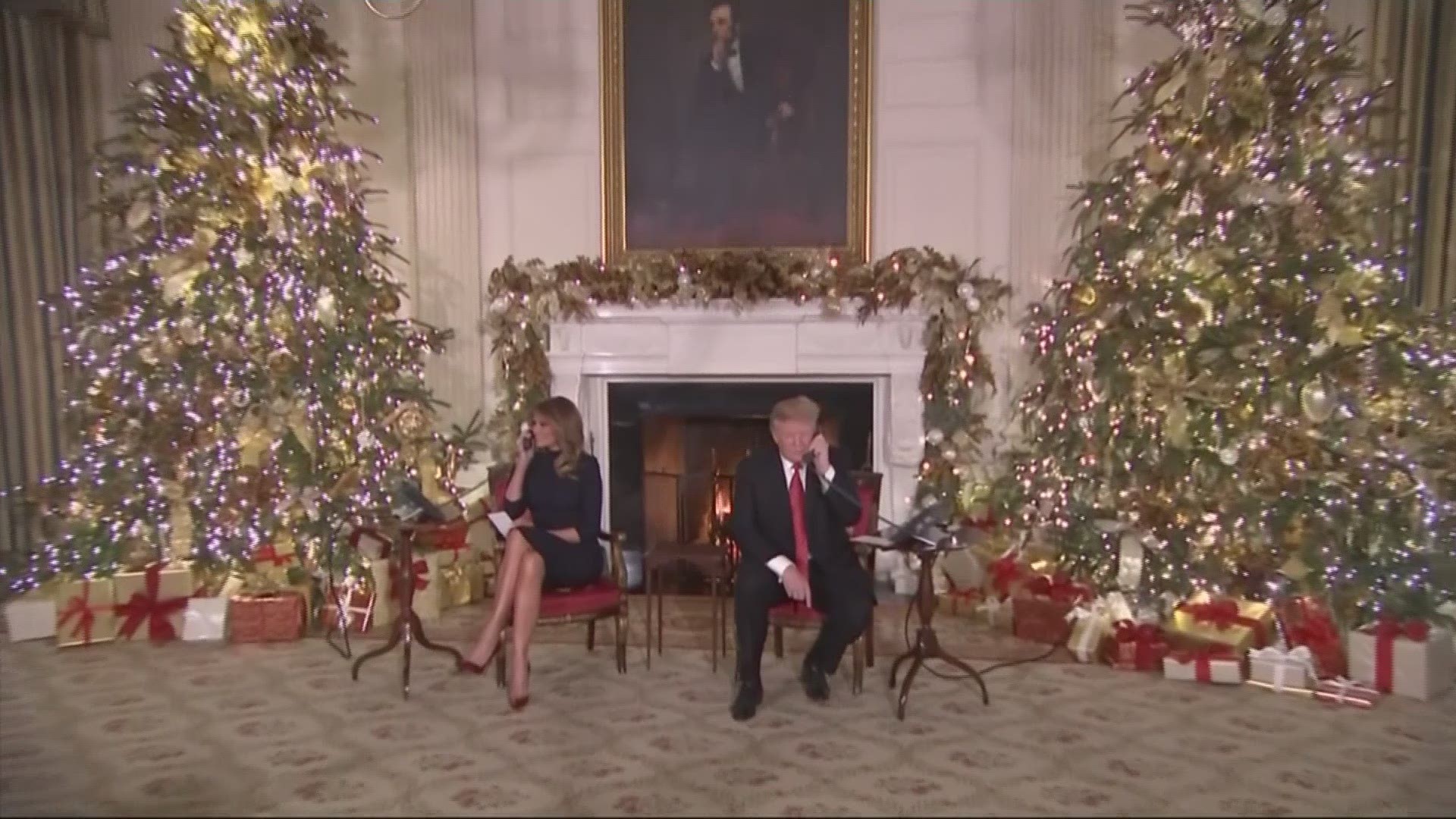 President Donald Trump and his wife Melania fielded children's telephone calls in the White House on Christmas Eve.