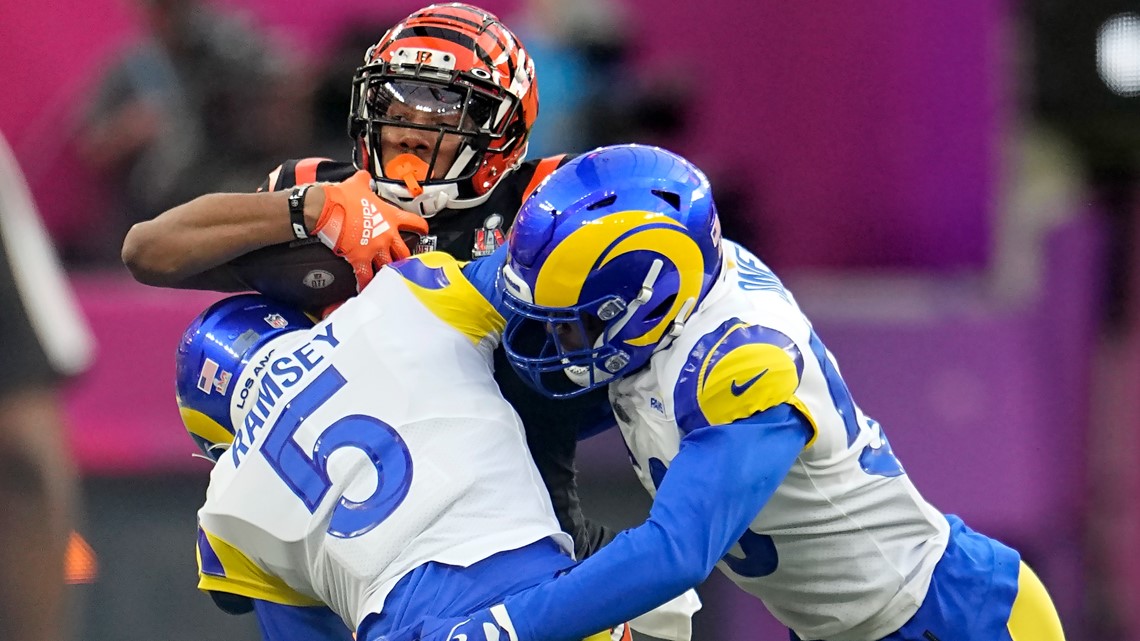 Los Angeles, United States. 13th Feb, 2022. Cincinnati Bengals wide  receiver Ja'Marr Chase (1) makes a 46-yard catch over Los Angeles Rams  cornerback Jalen Ramsey (5) during the first half of Super