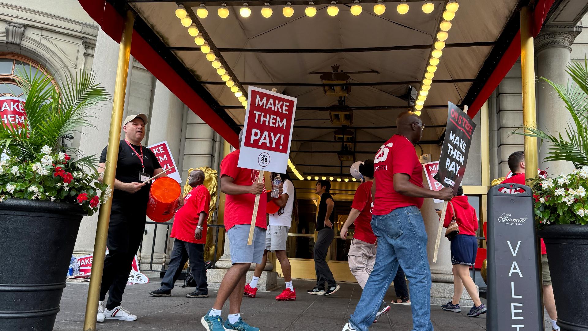 Roughly 10,000 workers from Hyatt, Marriot and other hotel chains took to the streets to push for better pay, health care and more.