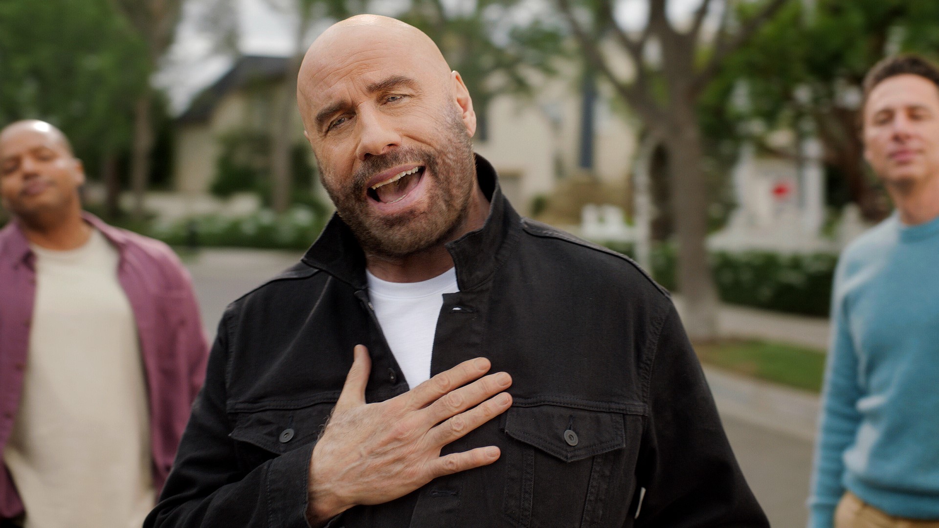 John Travolta revisits 'Grease' character in Super Bowl ad