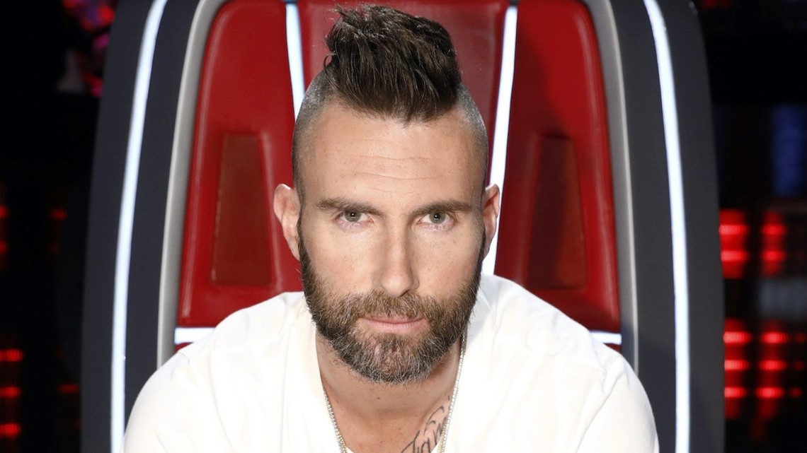 Adam Levine debuts shaved head in new Maroon 5 music video