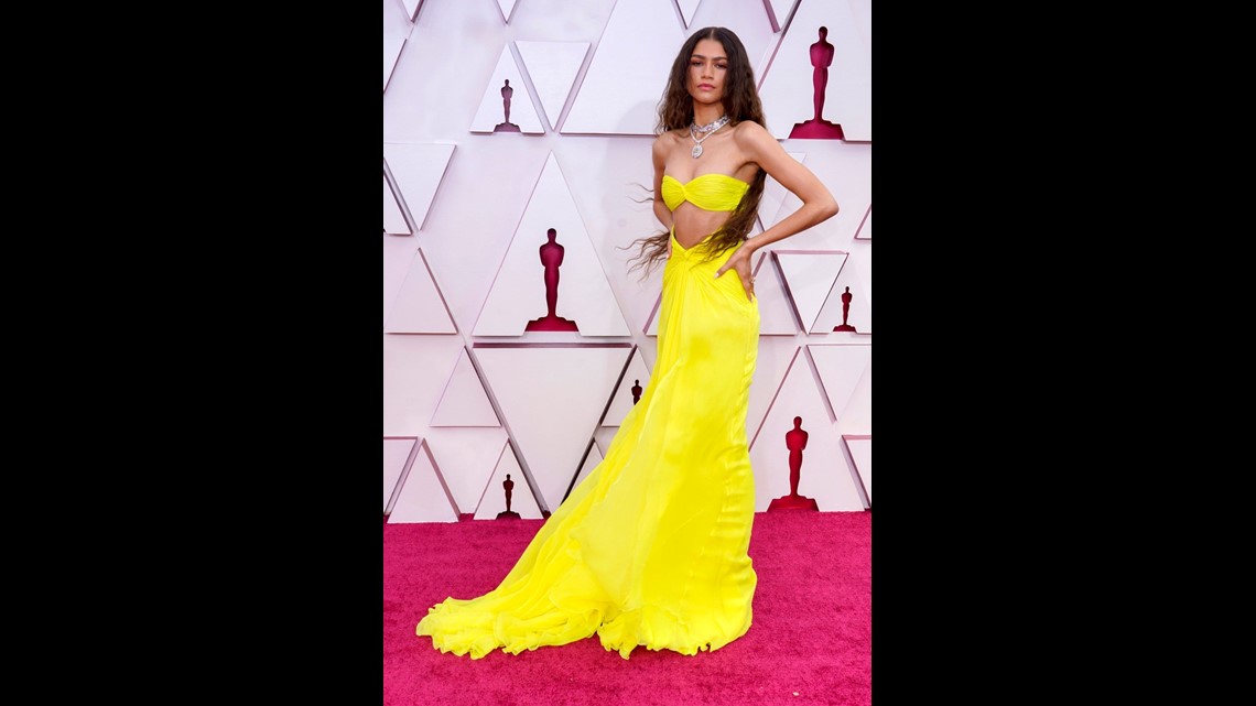 Zendaya Stuns in Yellow Cut-Out Dress That Glows in the Dark at 2021 Oscars  | kvue.com