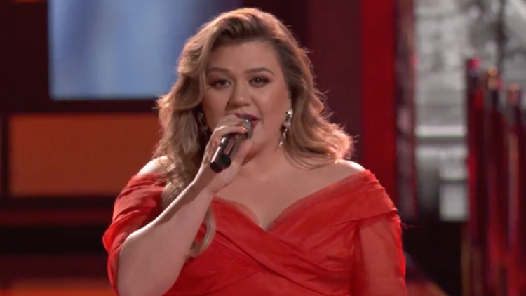 kelly clarkson red christmas dress Kelly Clarkson Performs 'Christmas Isn't Cancelled (Just You)' on 'The  Voice' Season 21 Finale