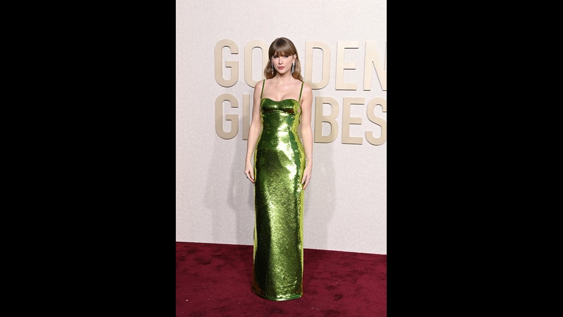 green emerald velvet dress Taylor Swift in Green Dress 404 Celebrity Cutout – LifesizeCutouts