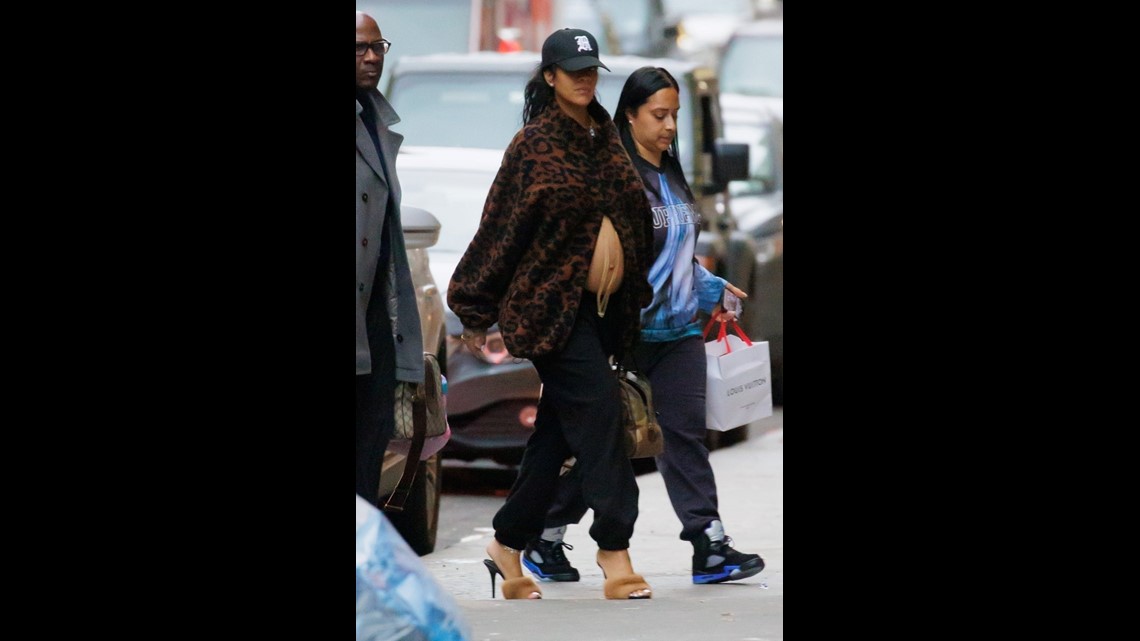 Rihanna shows off growing baby bump with A$AP Rocky at Louis