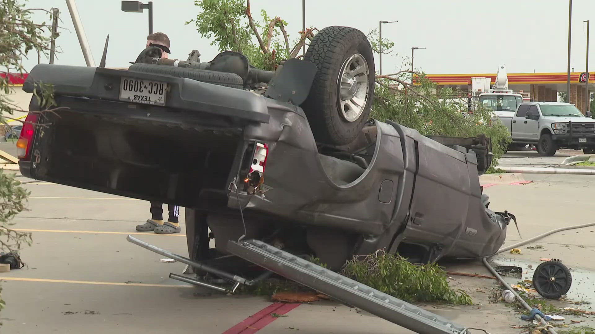 The tornado reportedly carried Ryan Leamer's truck across multiple lanes and into a bank parking lot. He was somehow able to escape and make it out alive.