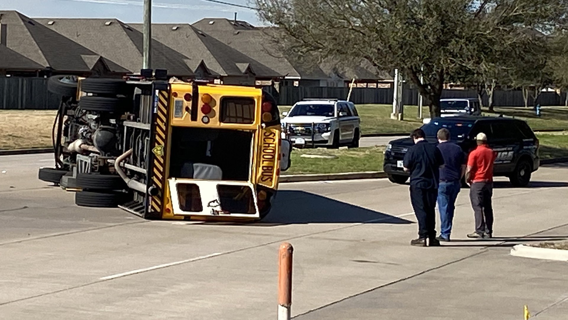 Cy-Fair school bus flips on its side in crash, students treated for ...