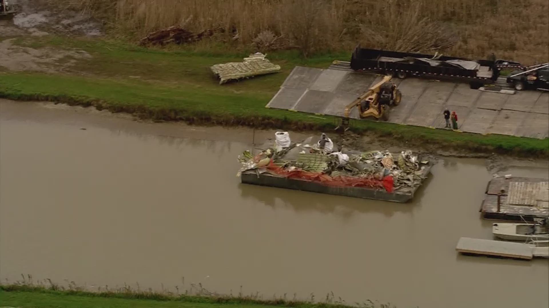 Air 11 flew over the scene a week after the cargo plane crashed in Trinity Bay in Chambers County.