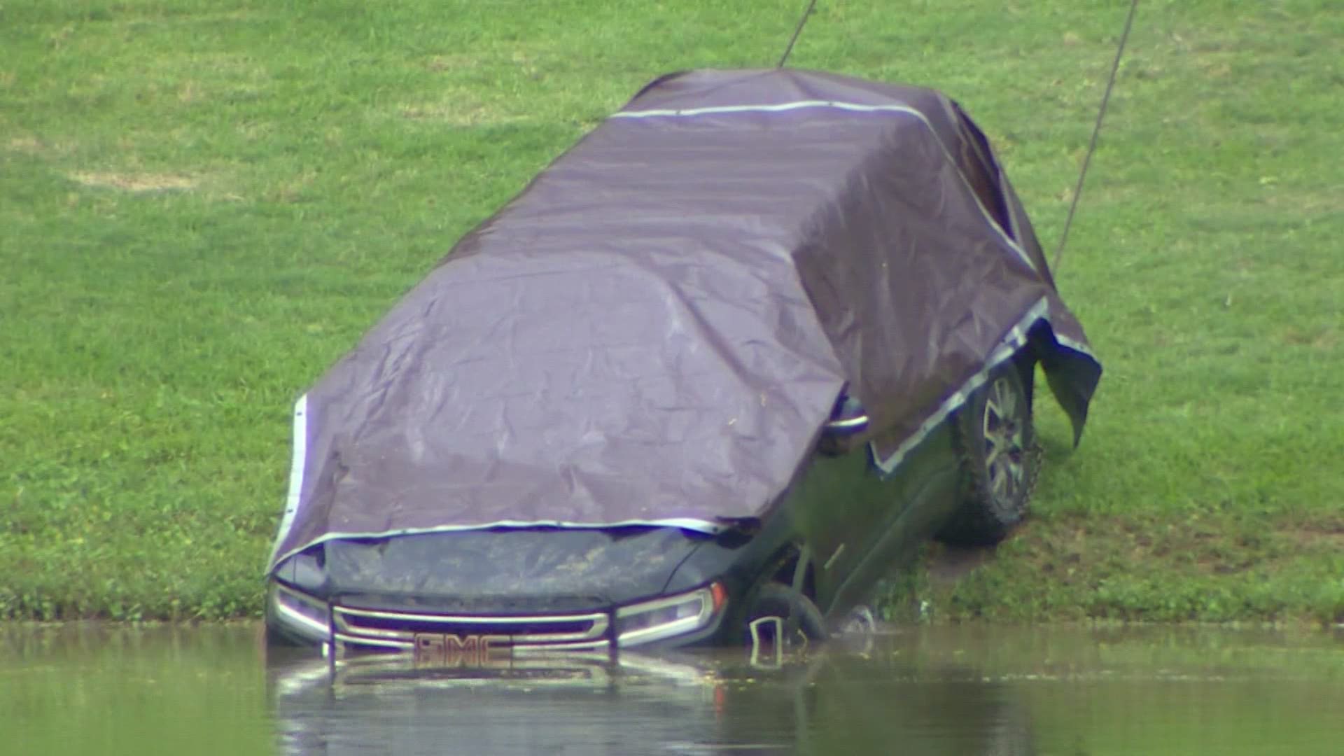 A vehicle belonging to missing woman Erica Hernandez was pulled Tuesday from a Pearland pond with a body inside.