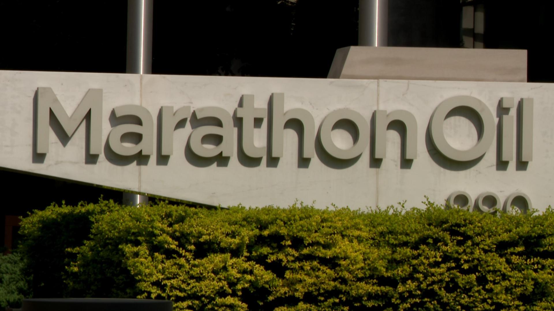 Marathon Oil has announced plans to lay off hundreds of employees following its $22 billion merger with ConocoPhillips.