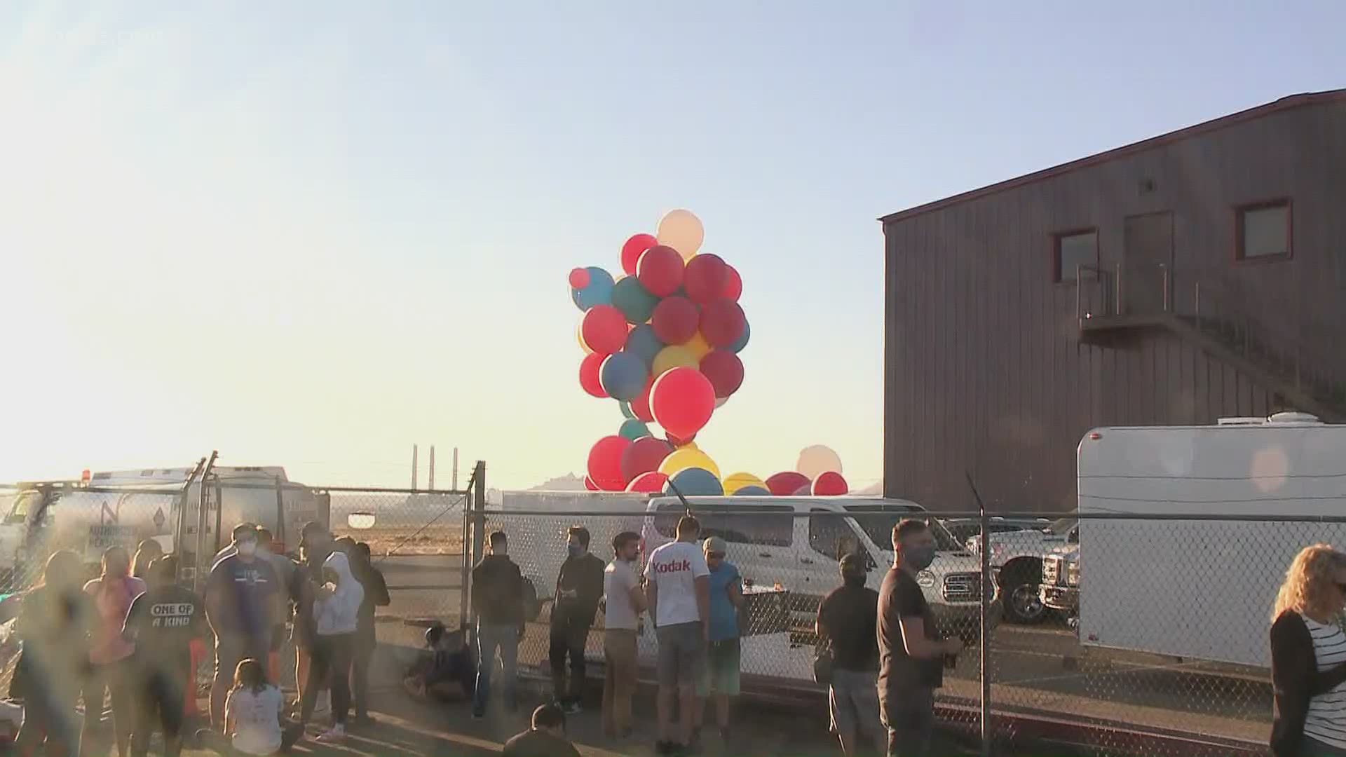 A small crowd has gathered in Page, Arizona, where David Blaine is expected to float about three miles in the air in his latest stunt.