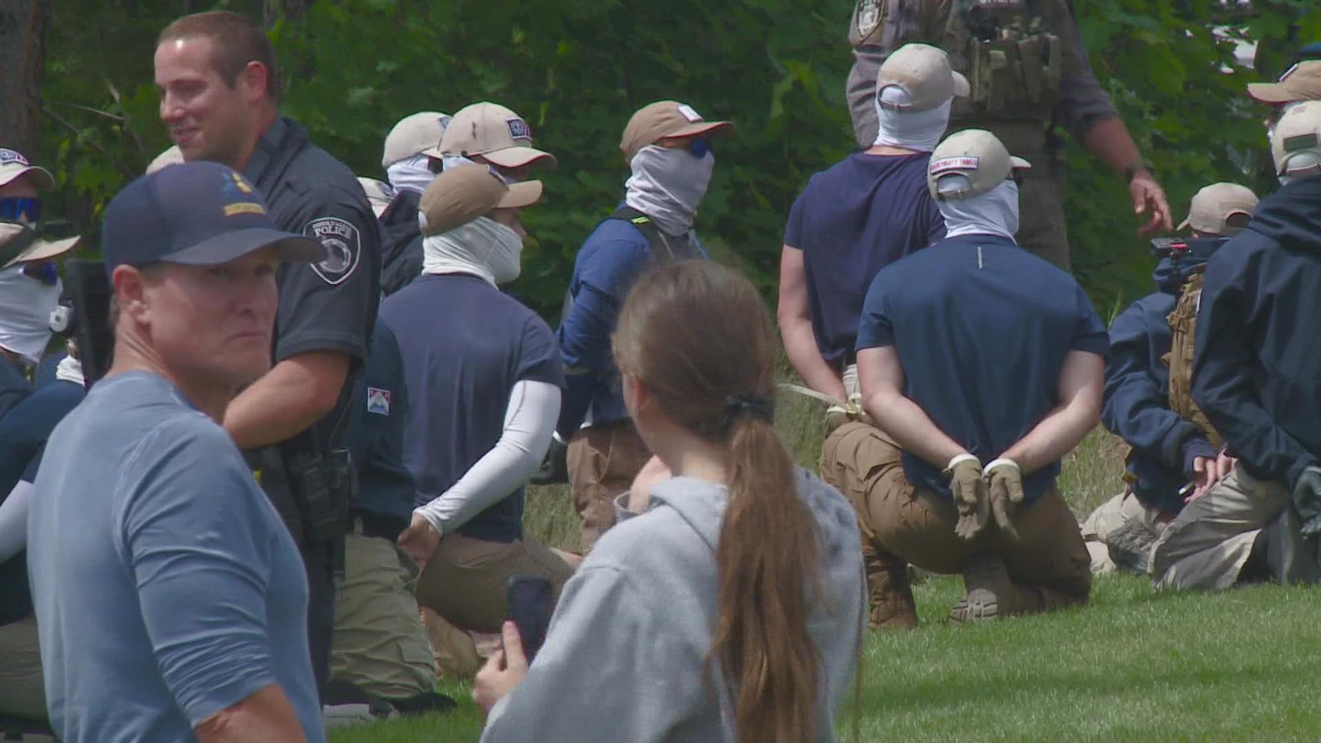 Police arrest 31 people with ties to white nationalist hate group near Pride event in Coeur d'Alene