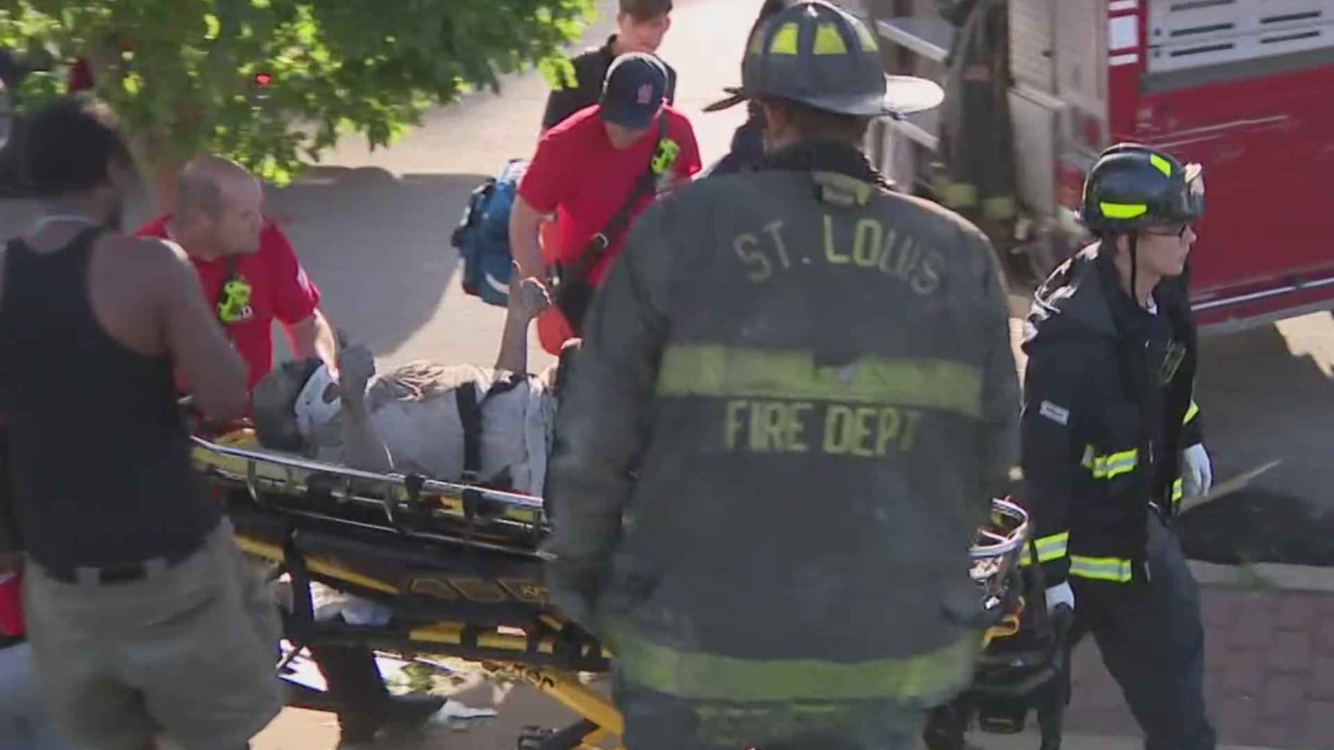 After several hours of hard work, a man named Garfield was rescued from a collapsed building at Newstead and St. Louis Avenue in the Ville neighborhood.