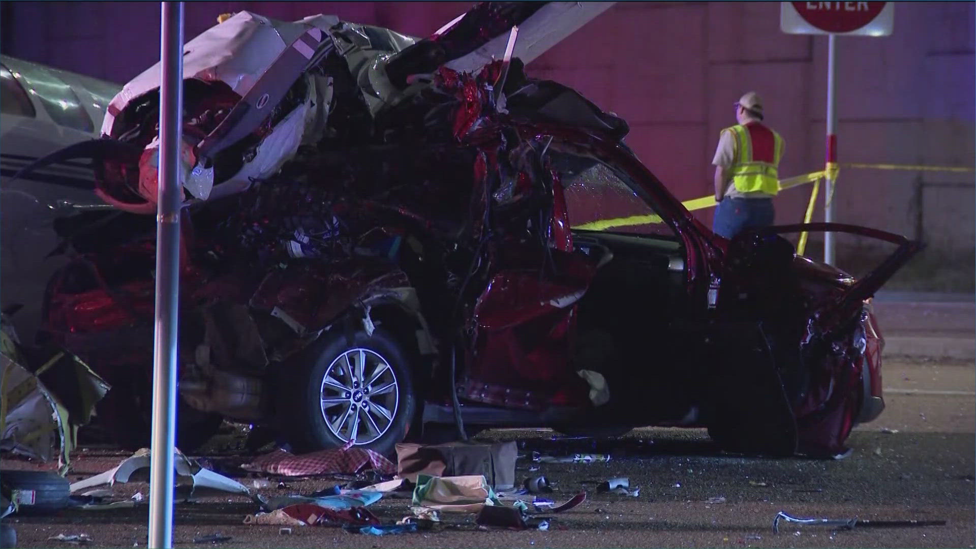 Images from the scene showed the plane split in half at the fuselage, and part of the plane wreckage sitting on top of a damaged car.