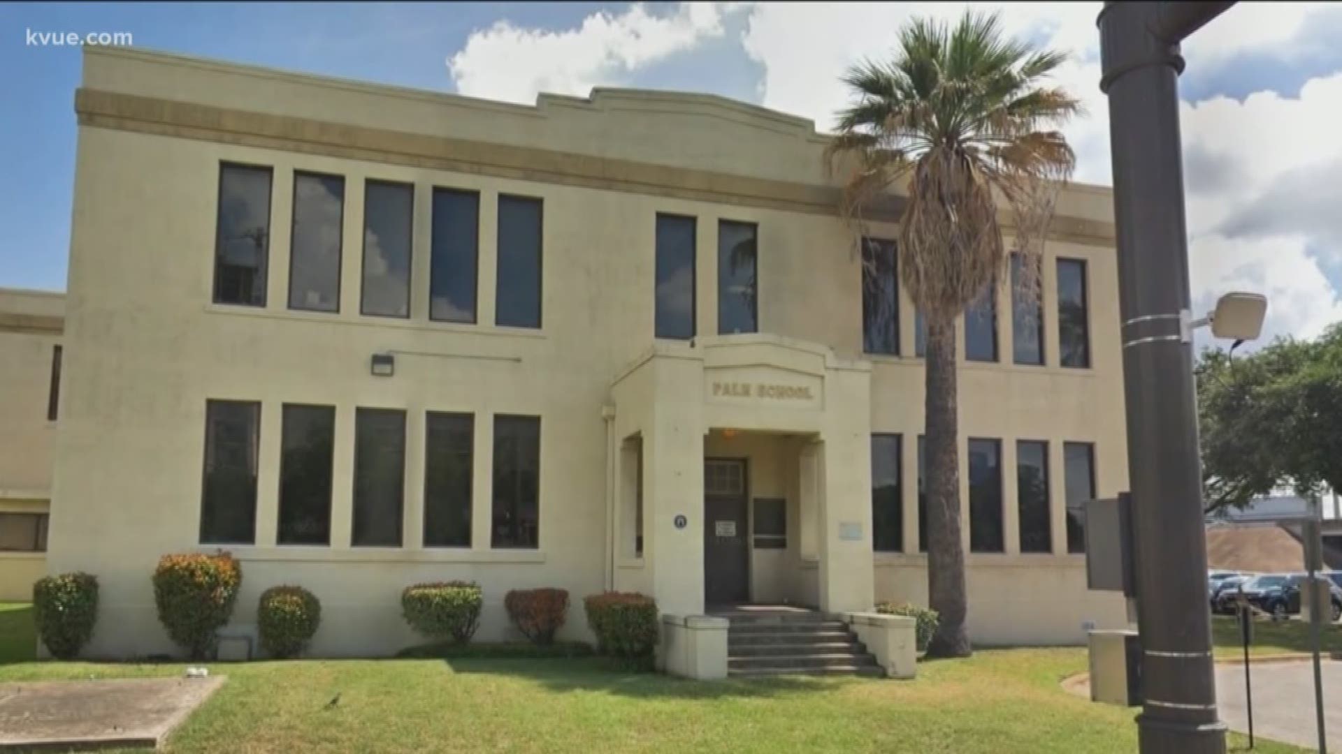 Travis County currently owns the old Palm School building.