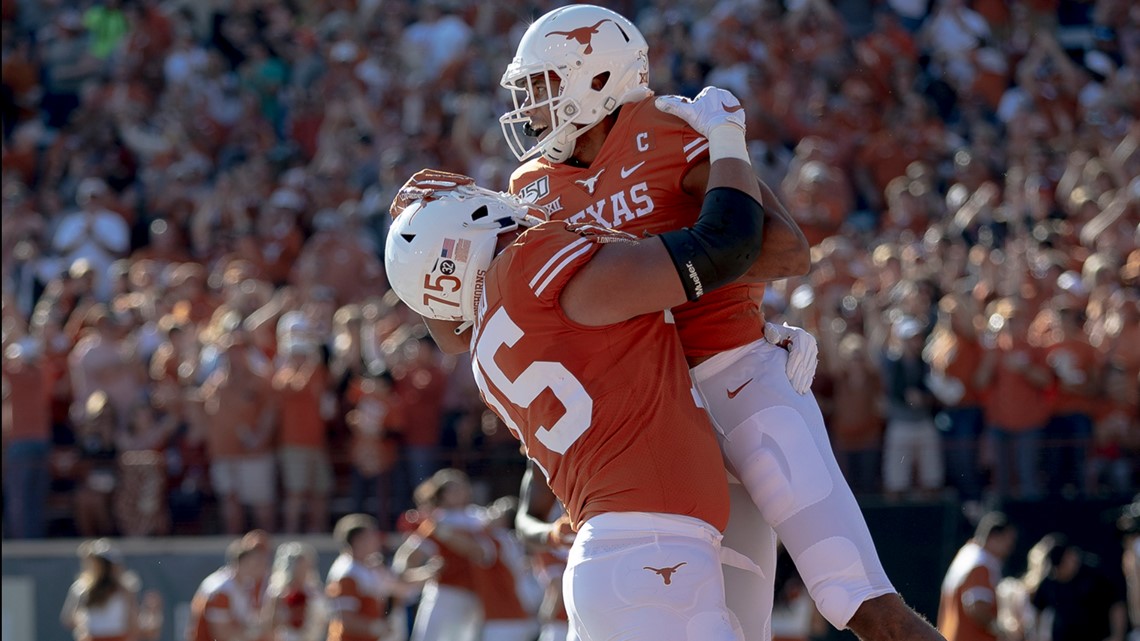 Texas' Keaontay Ingram (26) runs for a touchdown against Kansas State  during the second half of an NCAA college football game in Austin, Texas,  Saturday, Nov. 9, 2019. (AP Photo/Chuck Burton Stock