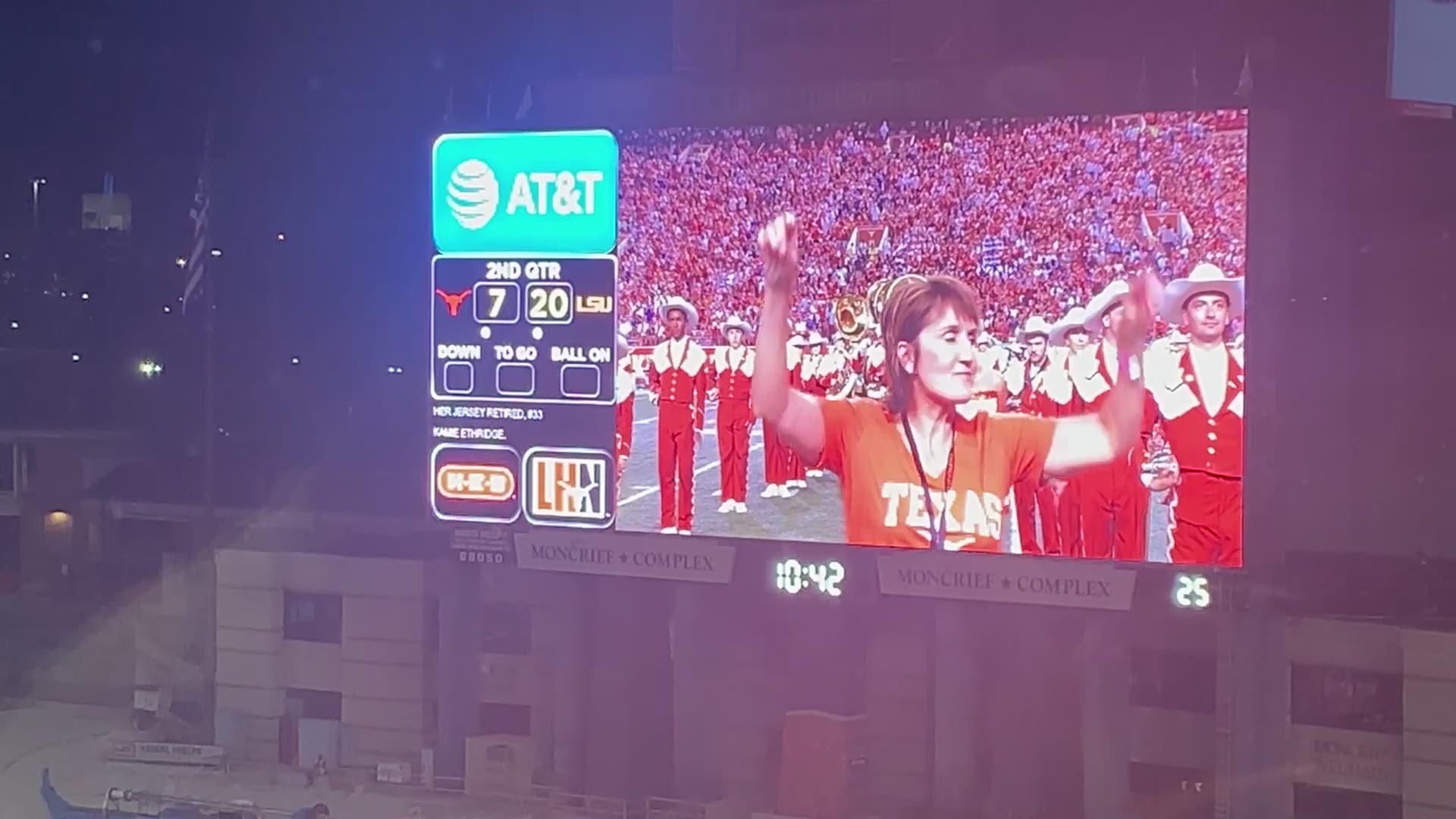 On Saturday night at DKR, she became the first female student athlete at Texas to have her jersey retired.