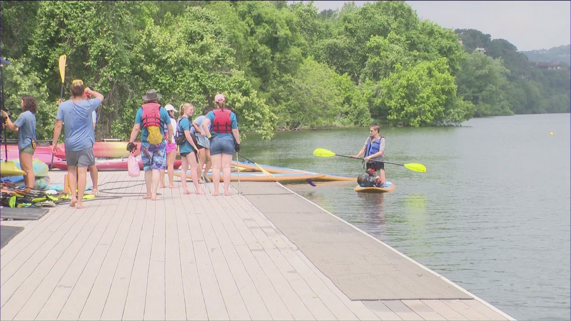 Hundreds of volunteers were out on Lady Bird Lake, cleaning up the water and the surrounding trail.