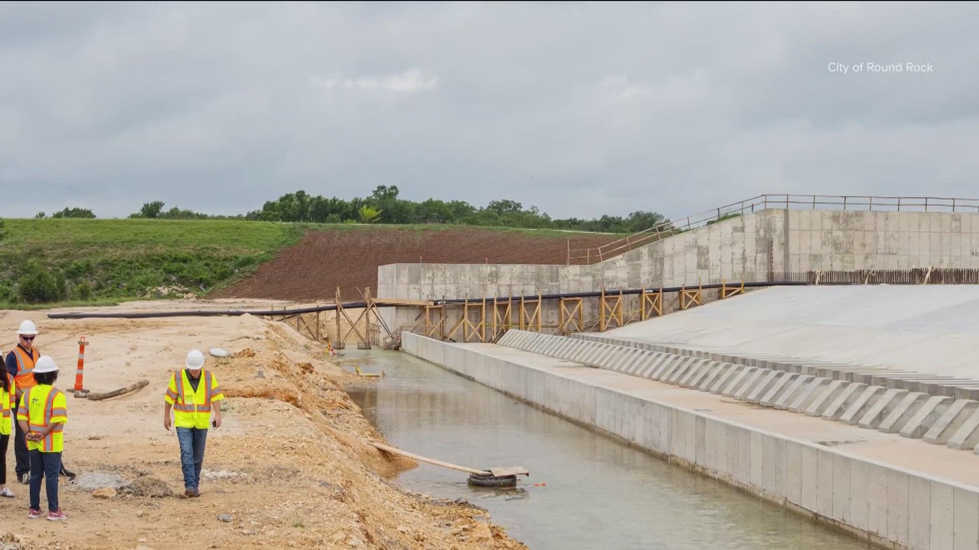 A major dam project along Lake Creek is nearing completion. It will help protect more than 1,000 homes from floods.