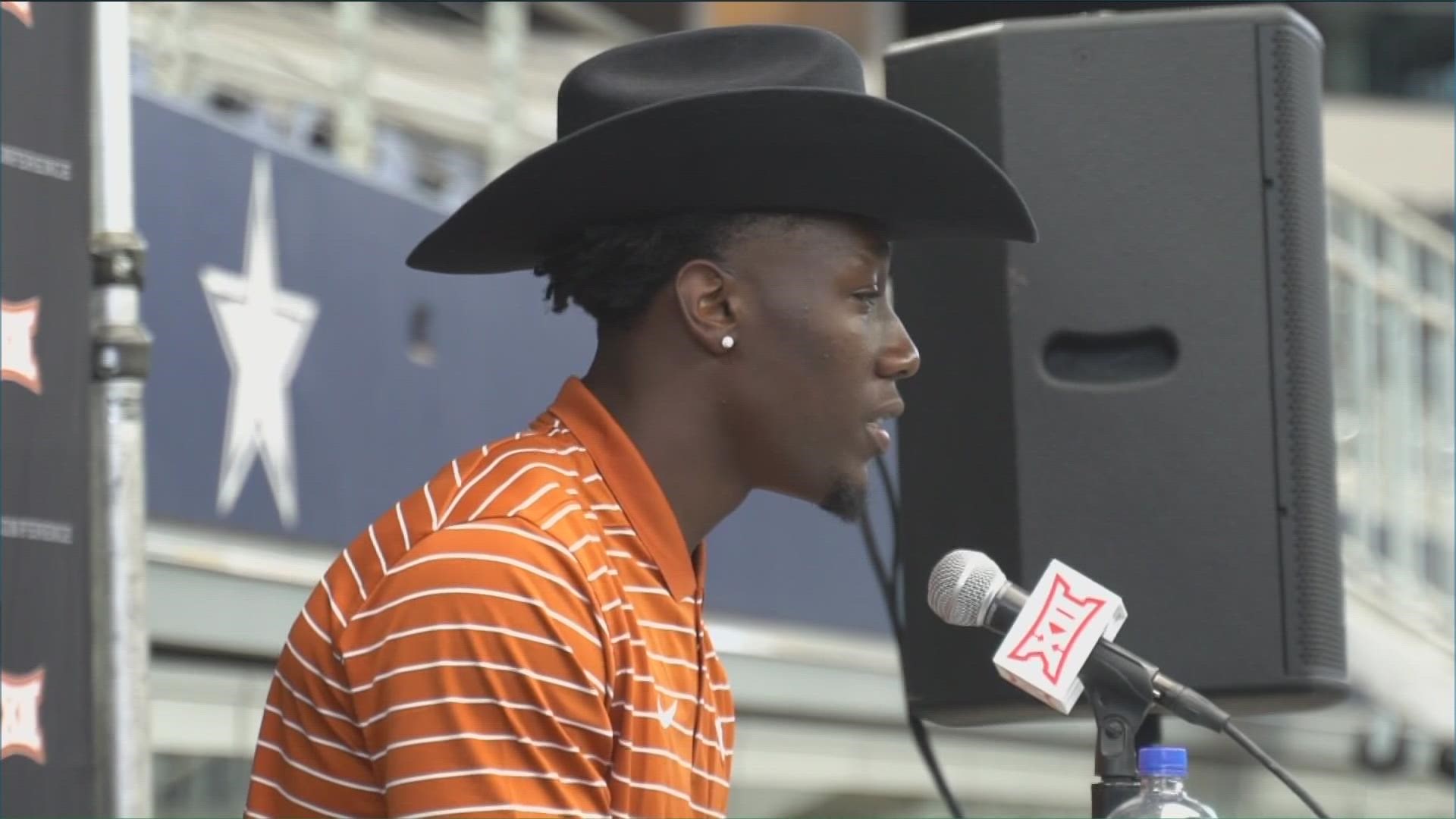 Linebacker Demarvion Overshown and Coach Brennan Marion are rocking similar looks with cowboy hats, but who wore it first?