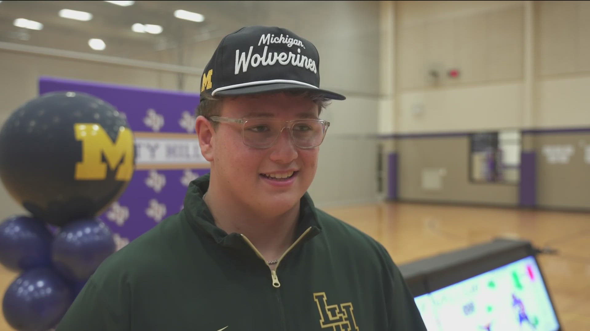 Liberty Hill defensive lineman Alister Vallejo has committed to Michigan. That announcement was complete with a Wolverines flag.