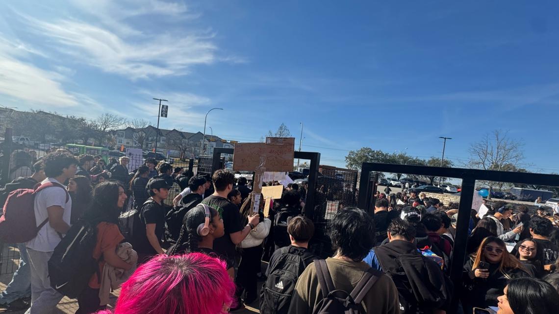 'They're scared their parents aren't going to come home' | Central Texas students lead walkouts over immigration concerns At Akins High School in South Austin, 150 students gathered carrying signs condemning ICE agents and their activity in Austin.