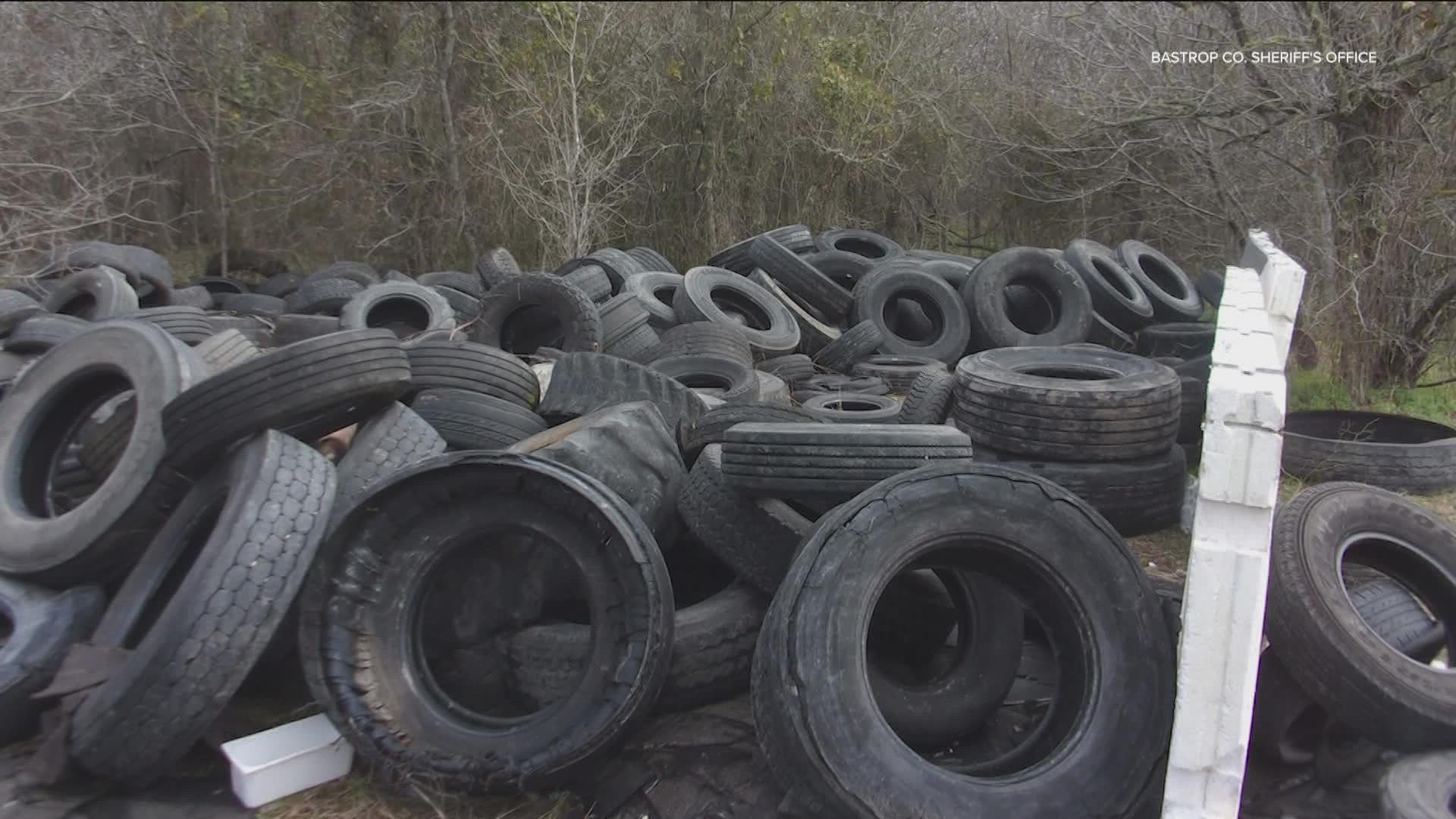 Officials say the two dumped approximately 1,900 pounds of tires on a property without the owner's approval.