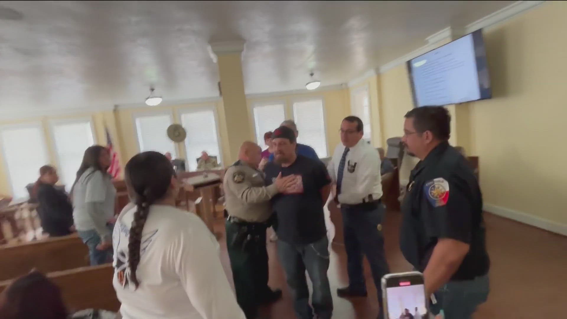 The father of one of the victims of the Robb Elementary School shooting in Uvalde was arrested Monday after an outburst during a commissioners court meeting.