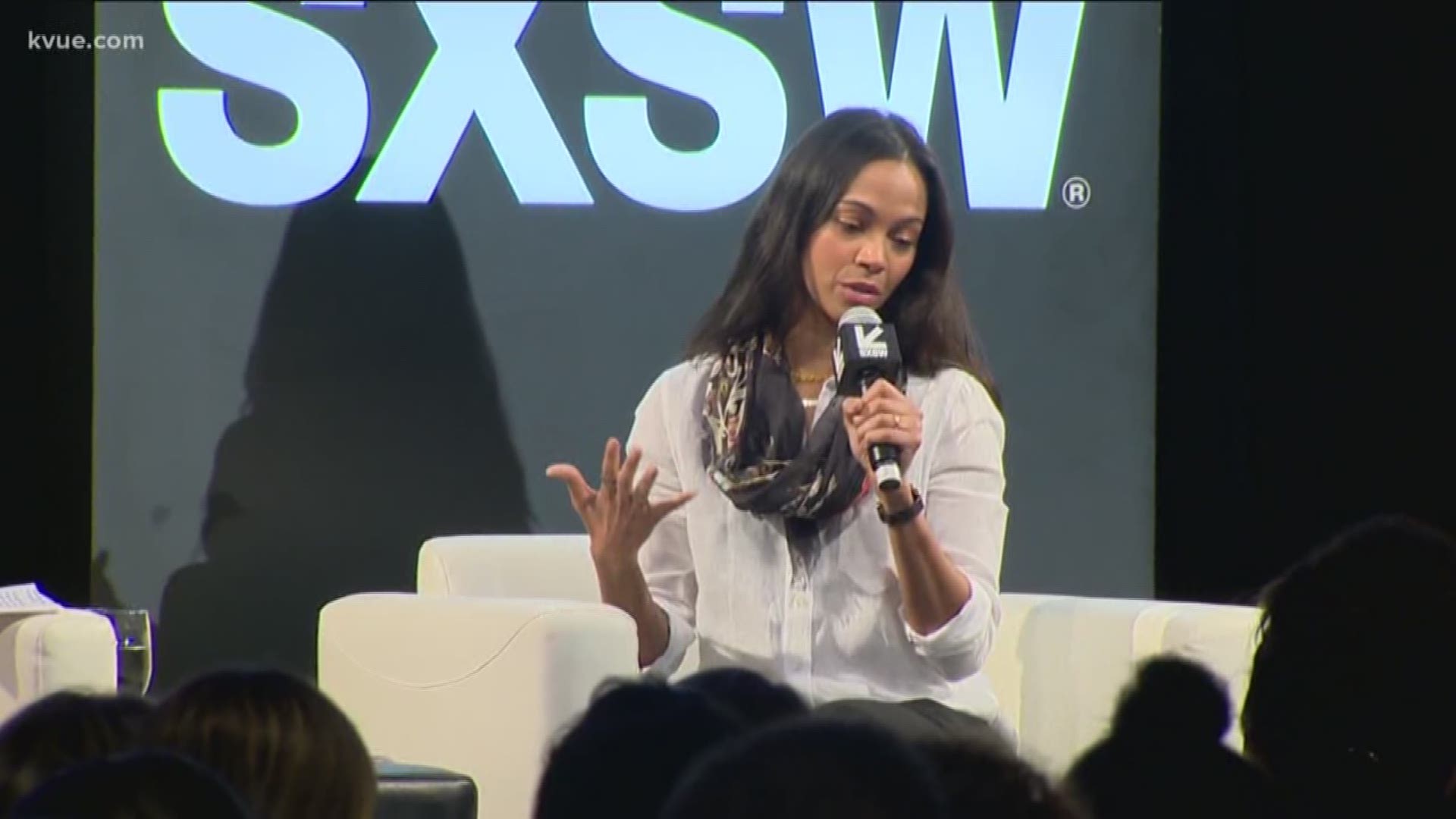 A little drizzle didn't keep festival-goers from SXSW, and that includes actress Zoe Saldana.