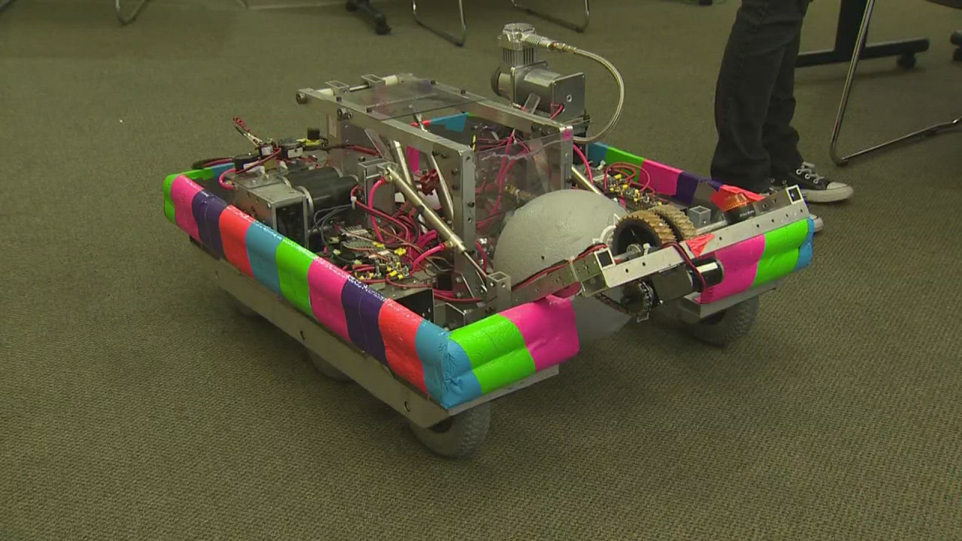 They have national sponsors, more than a dozen awards and enough brainpower to build and battle it out with robots. Austin's "lady cans" robotics team is headed to an international competition.