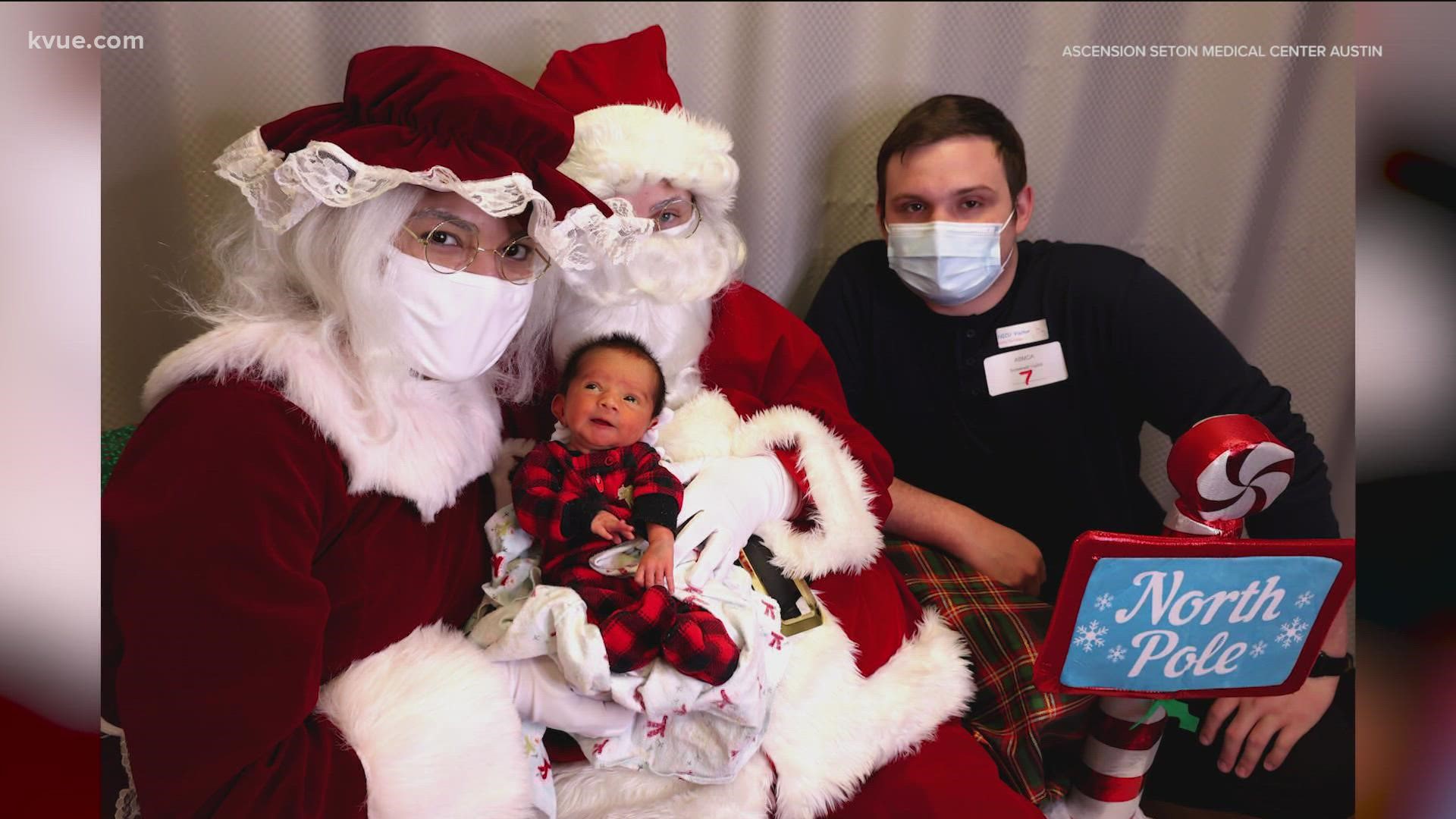 Babies were dressed in holiday outfits for their very first picture with Santa.