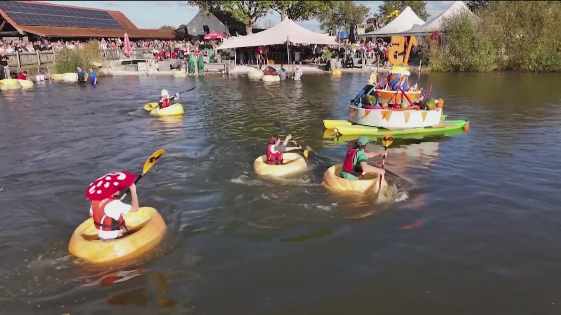 More than 300 participants raced across the water in carved out pumpkins. 