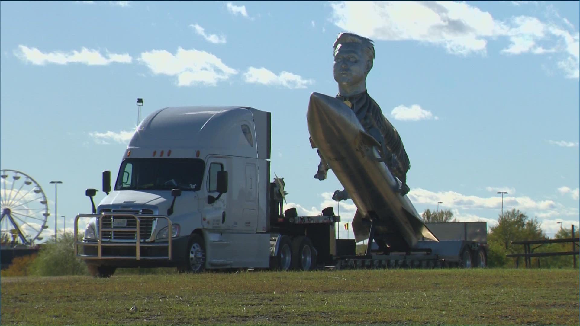 The statue features Musk's head on the body of a goat, all atop a rocket.