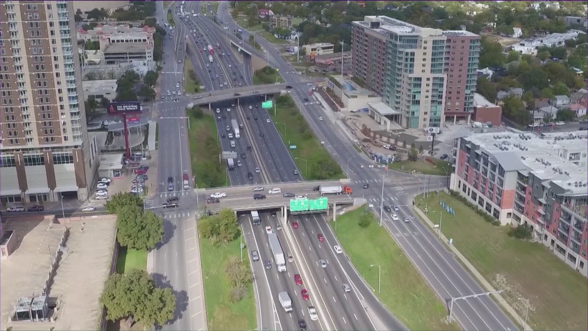 The new covering would cover sections of the interstate north of Downtown Austin, while the new boardwalk would run along Lady Bird Lake.