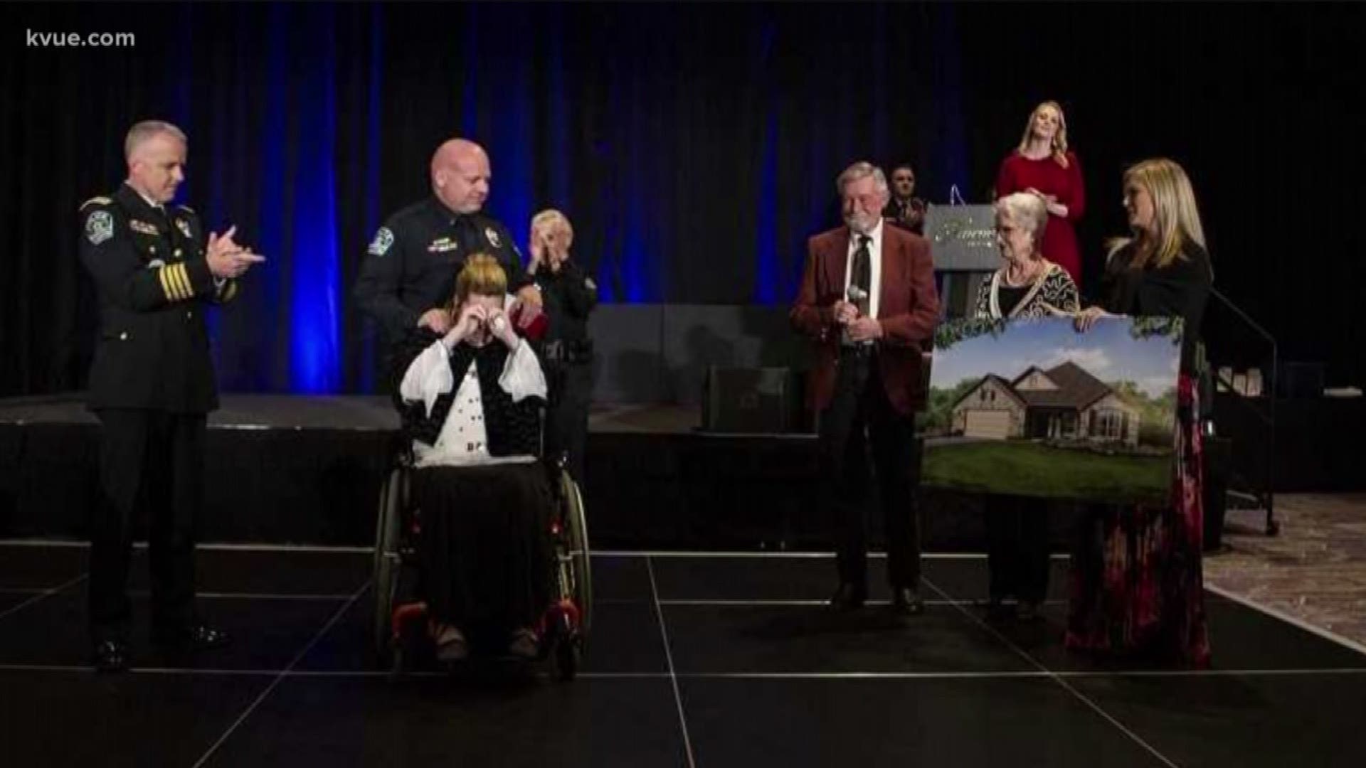 Officer Barrett was gifted a mortgage-free home at the "Stars of Distinction Awards Gala."