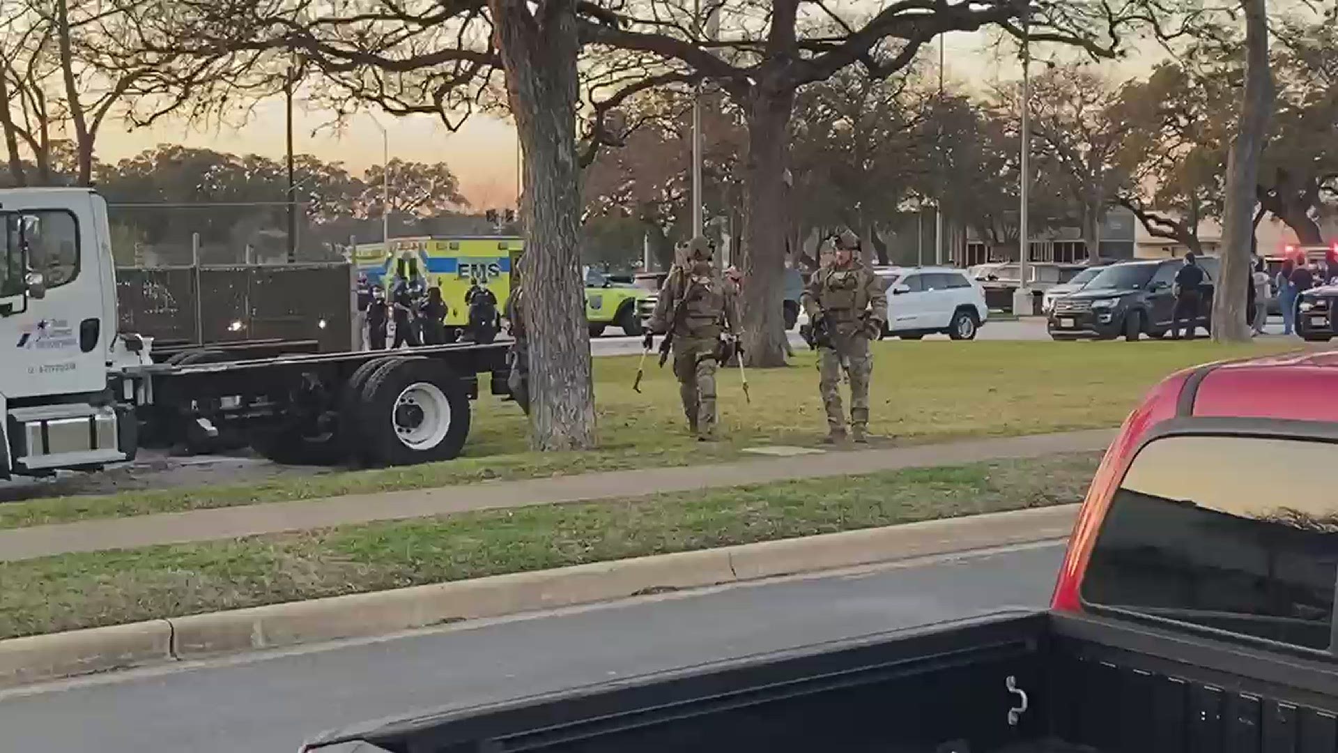 The SWAT team responded to a possible hostage situation in Central Austin on Tuesday evening. Video courtesy of Shiv Mishra and Nicolas Baumann.
