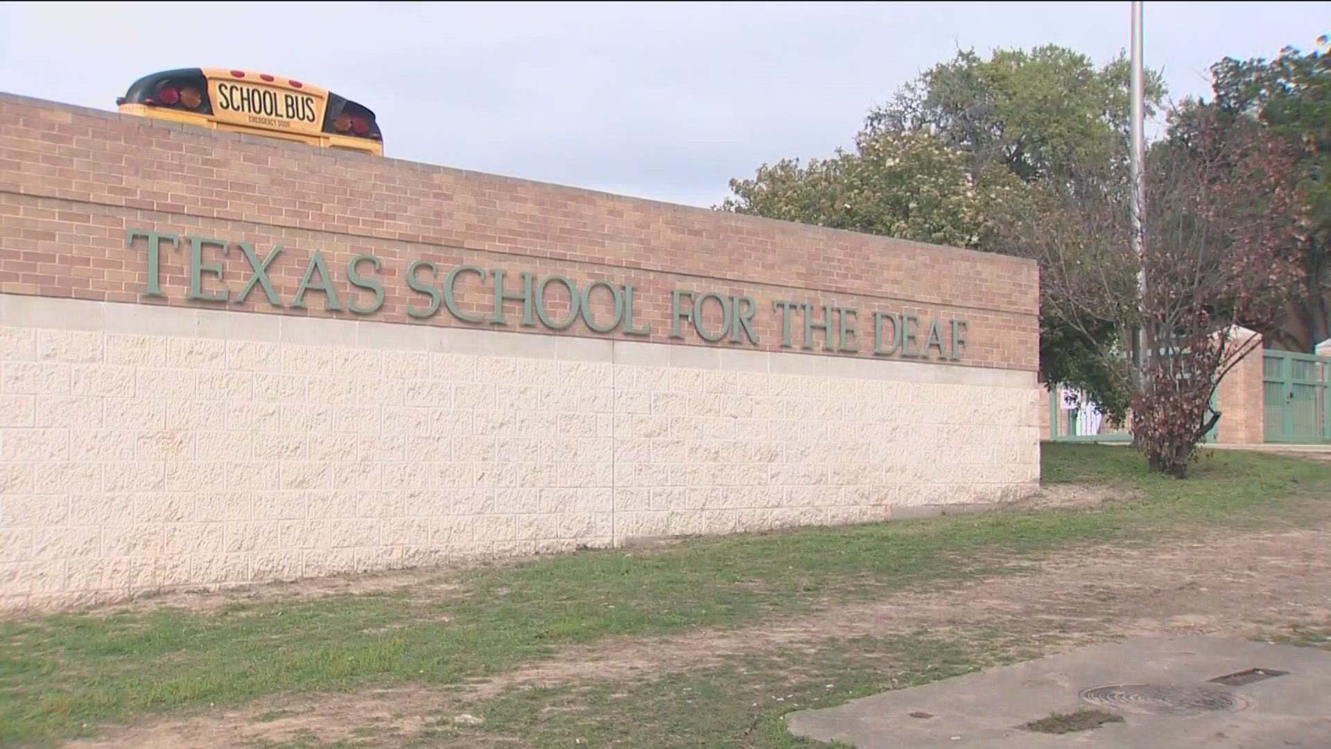 Officials say the Texas School for the Deaf is laying off its interpreters.