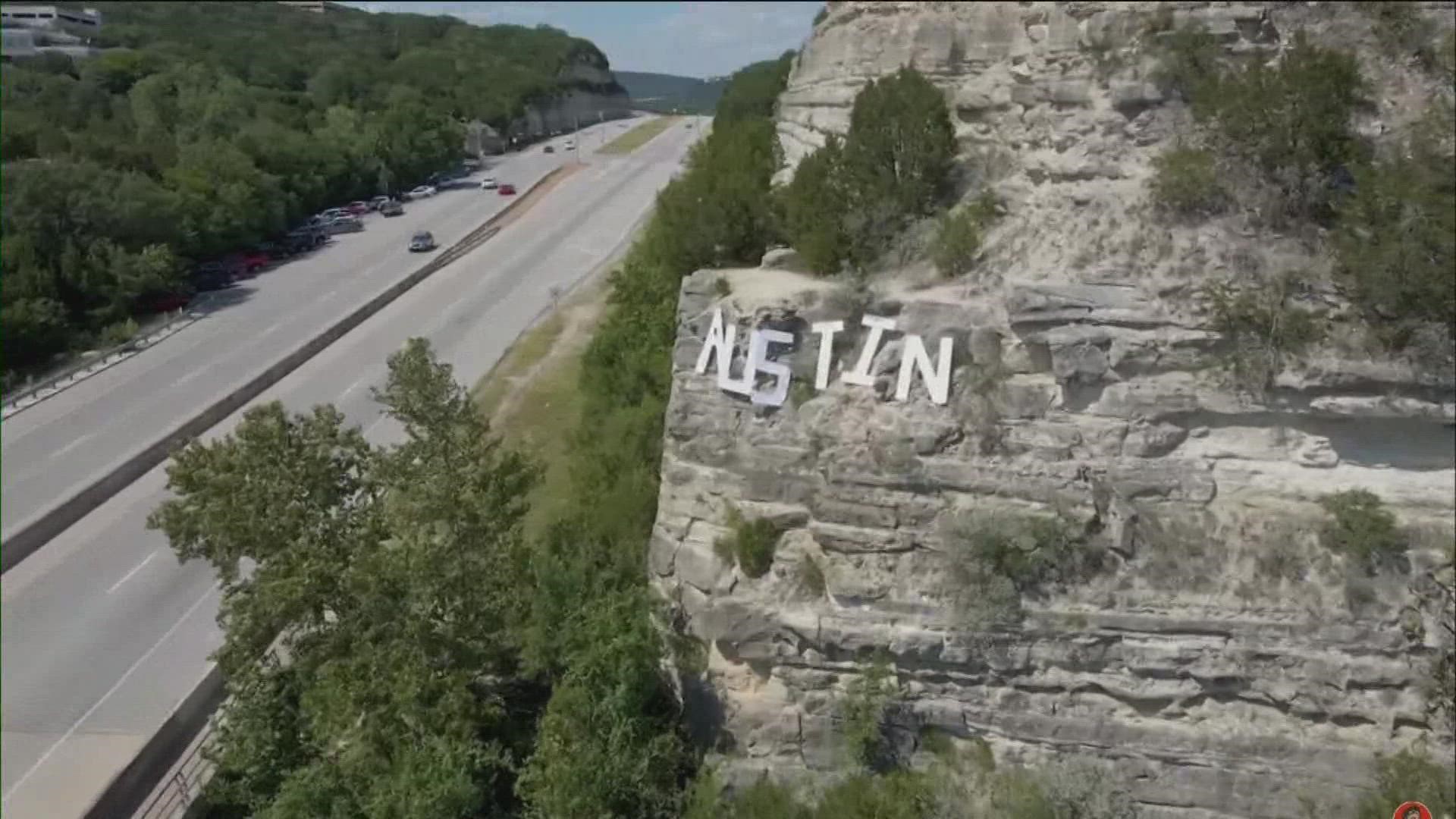 Blake Messick created a sign near the Pennybacker Bridge that spelled out "Austin" in the style of the iconic Hollywood sign.
