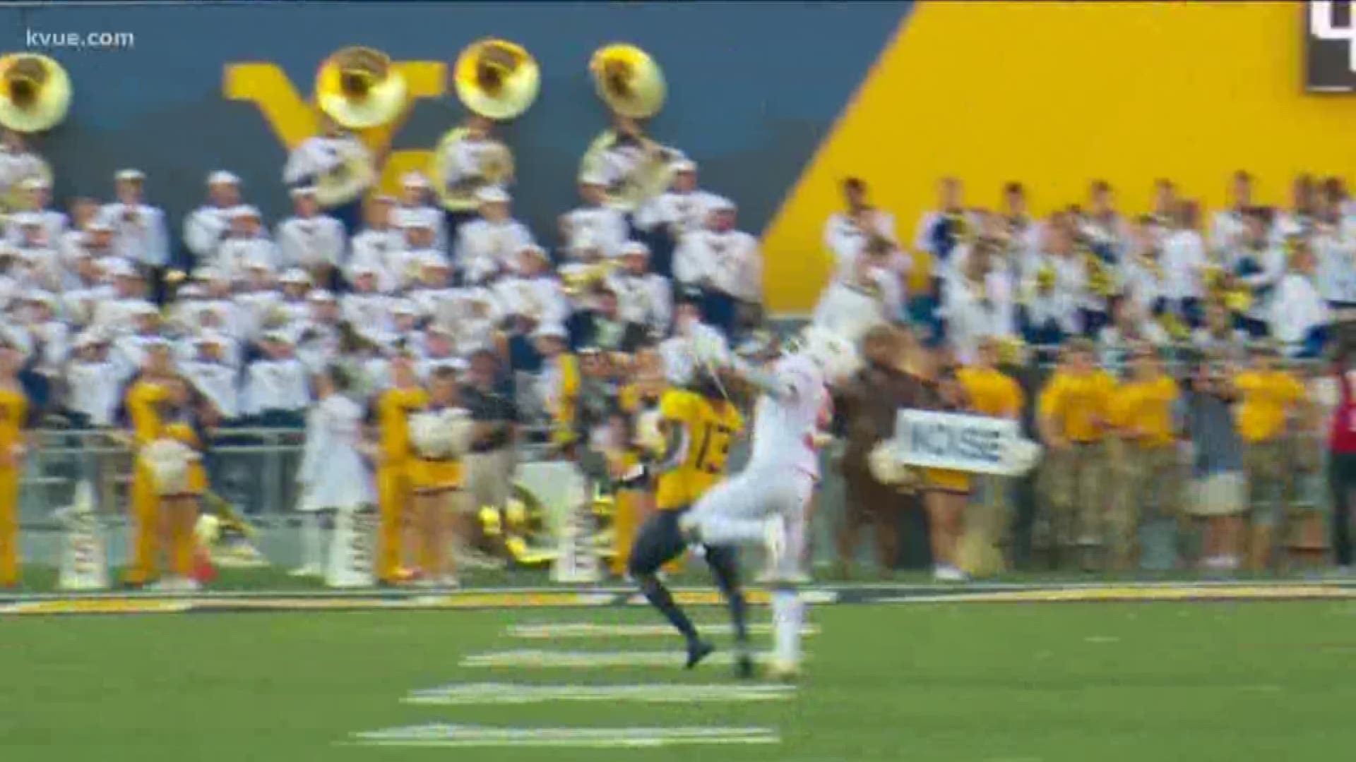 Texas Longhorns defensive back D'Shawn Jamison made one of the plays of the year when he snagged a one-handed interception against West Virginia.