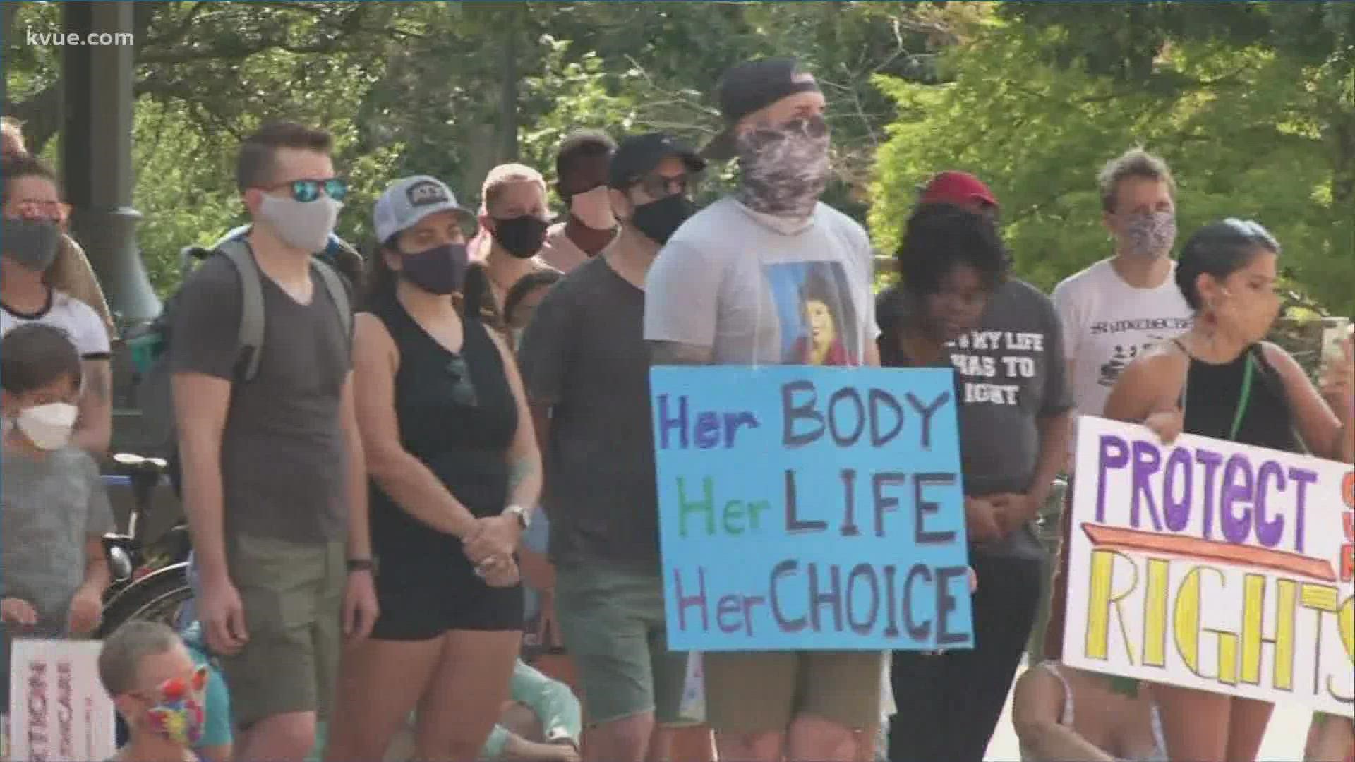 Civil rights and social justice organizations hosted a rally at the State Capitol against new Texas abortion and election reform laws.