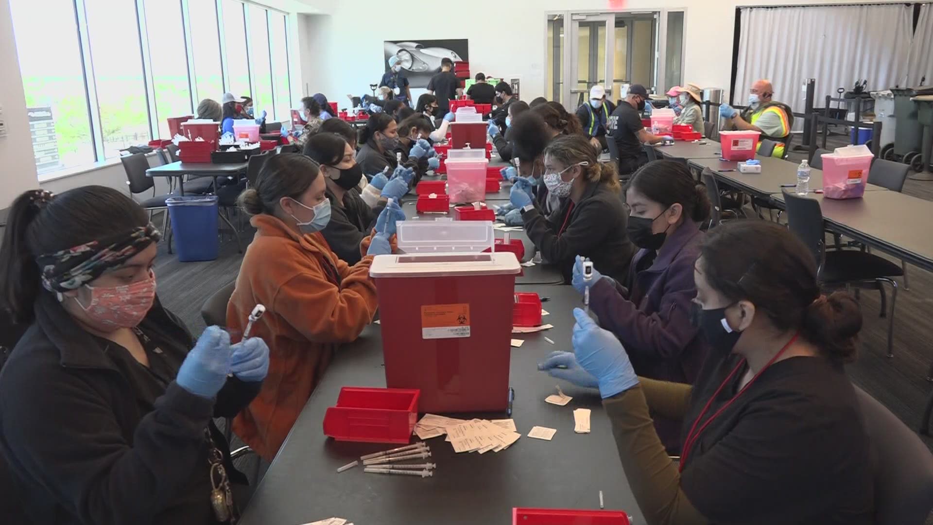 Travis County's COTA vaccination site is handing out more than vaccines and giving opportunities for some hands on experience to some Del Valle HS students.
