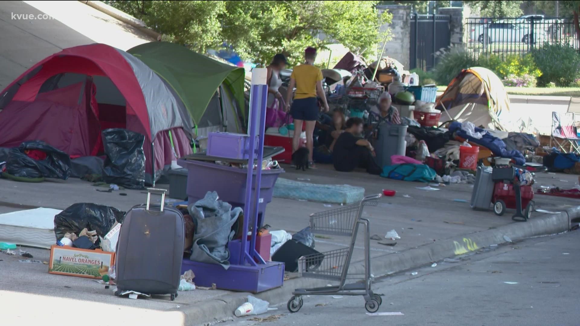 City leaders said 23 people who were camping under U.S. 183 at Oak Knoll Boulevard have been moved into a temporary shelter.