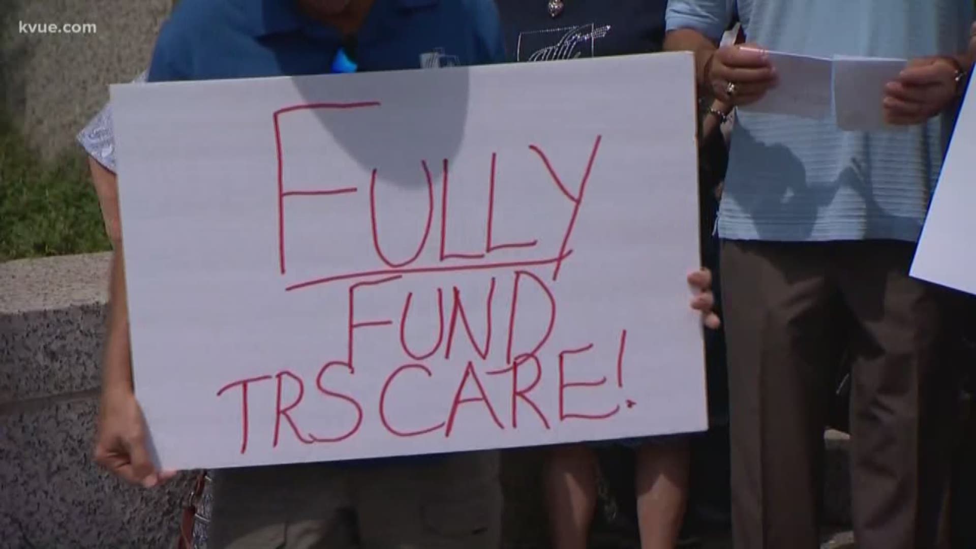 Groups of teachers, both current and retired, with the American Federation of Teachers made their voices heard in front of the Texas Retirement System building.